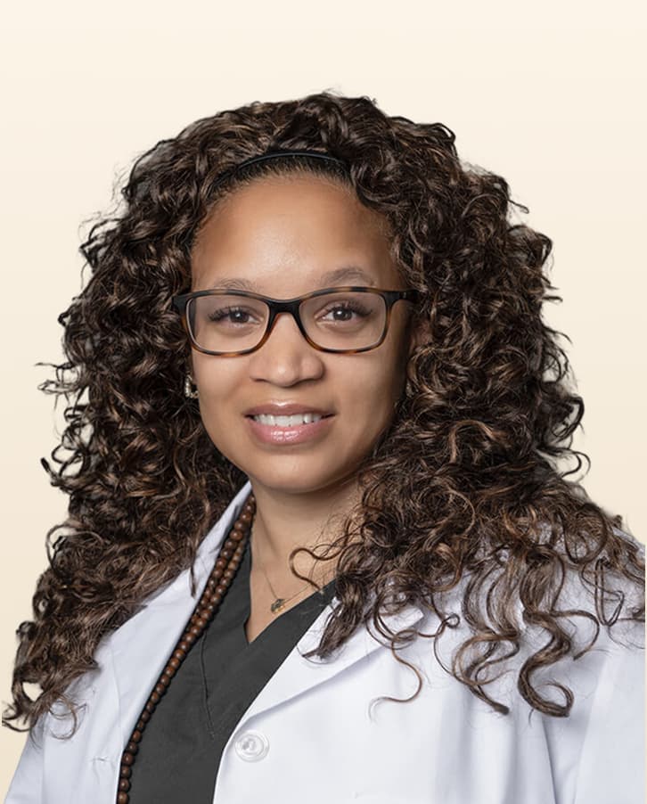 A professional portrait of  Kelly Mclean, FNP-C